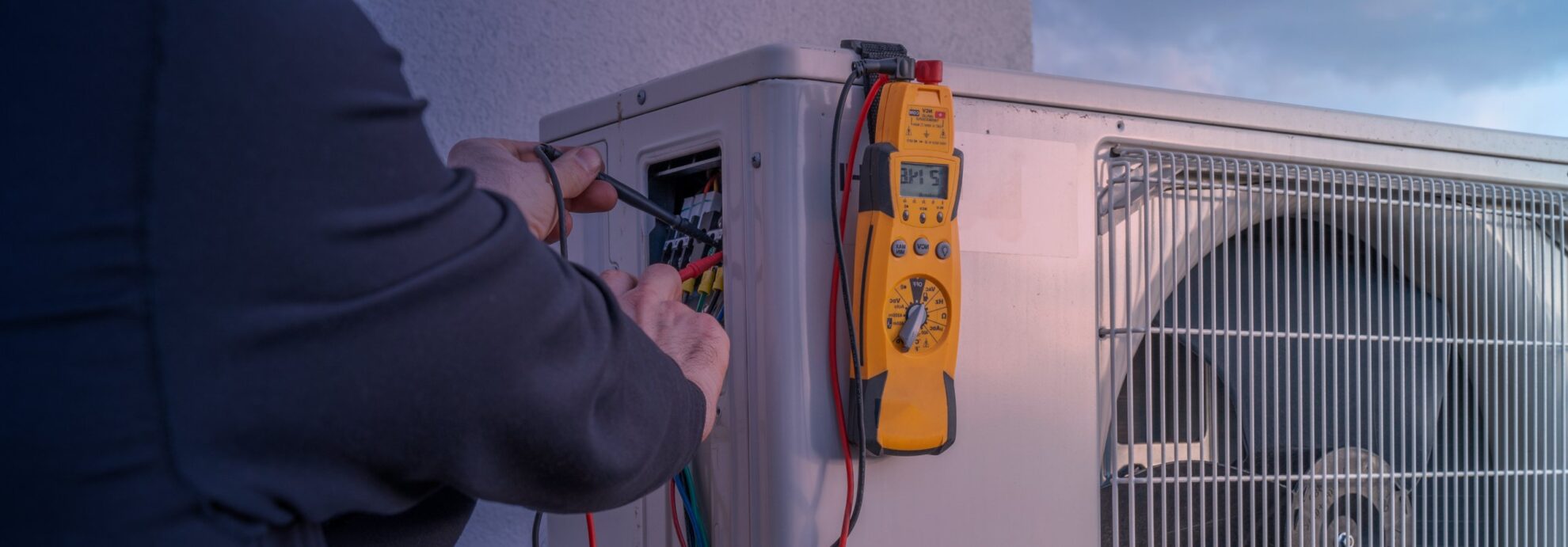 hands testing voltage with test leads at power terminals in remlap al